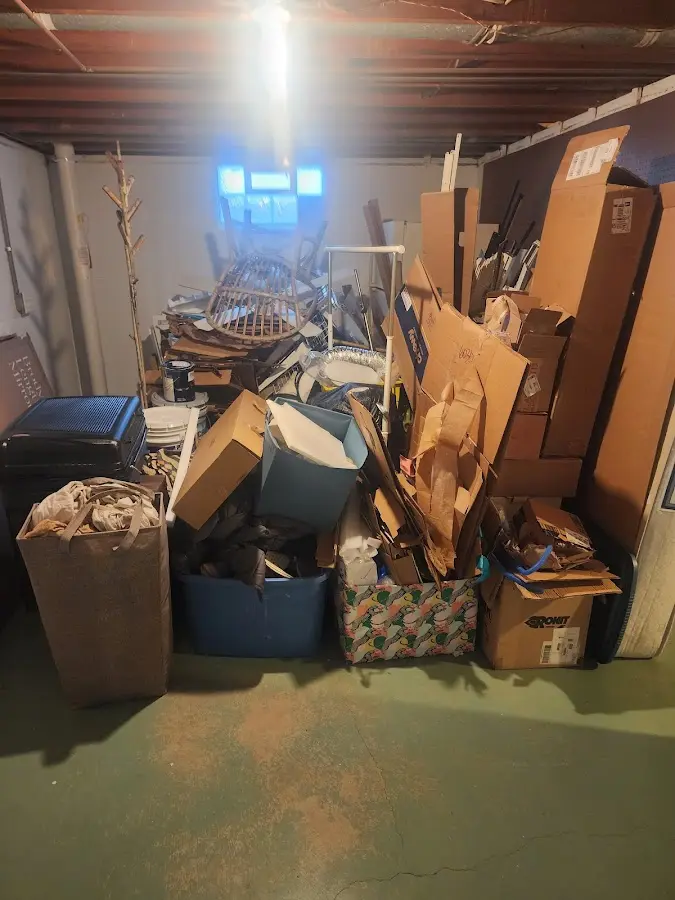 Roll-off dumpster container at job site for 2 Yard Dumpster Rental in Fruitland